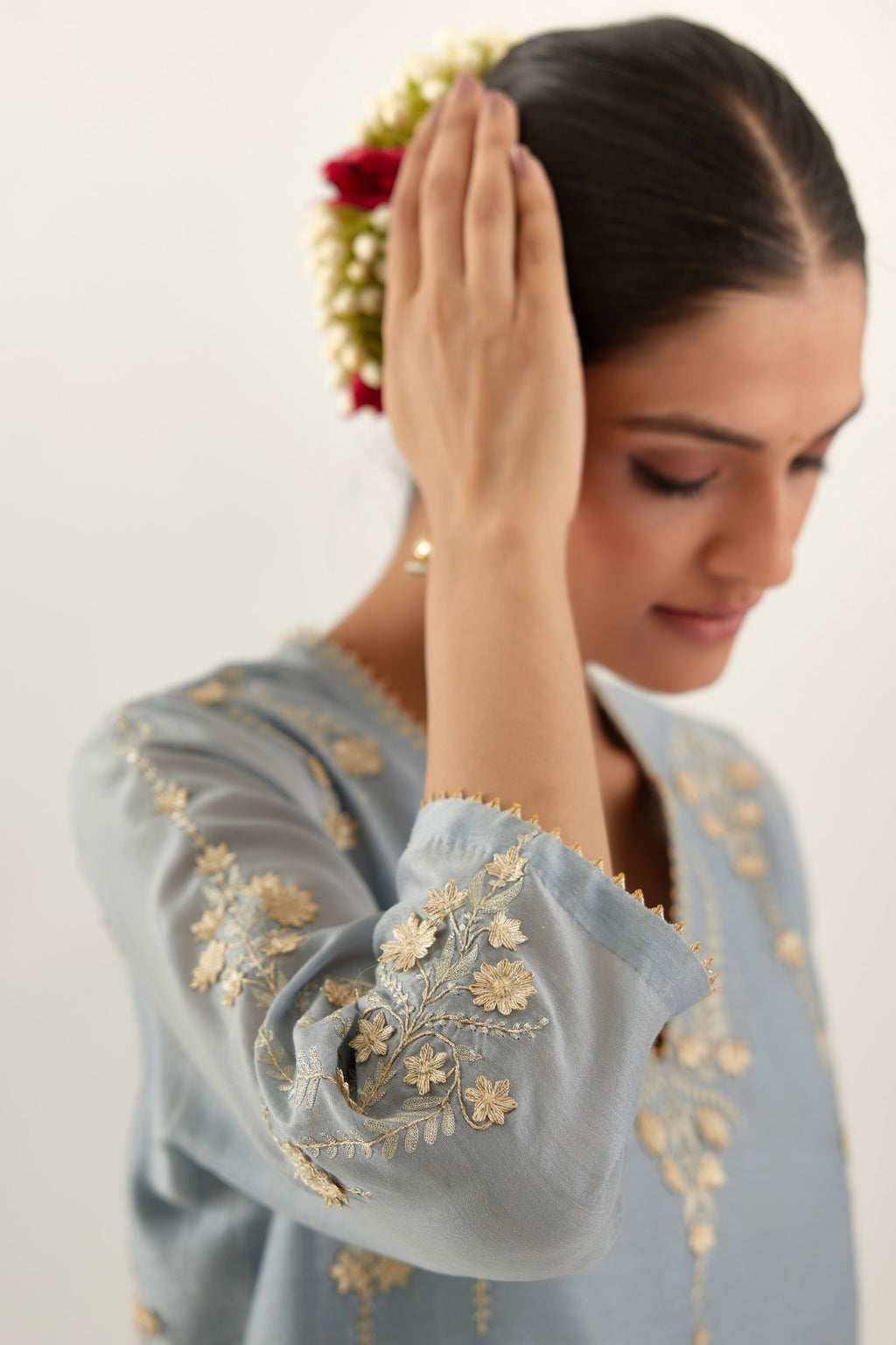 Blue silk chanderi straight kurta set, highlighted with gold zari and gota embroidery.