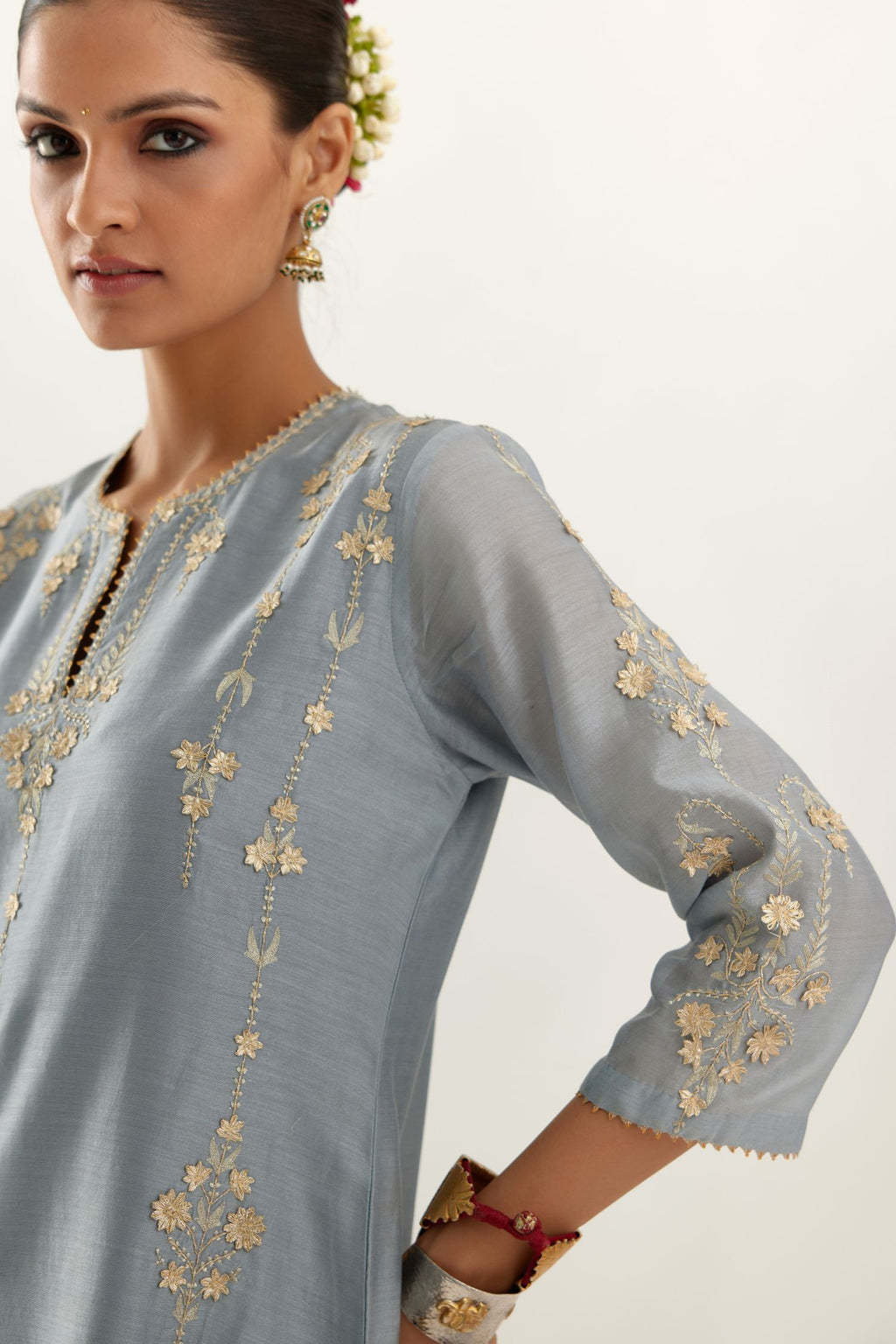 Blue silk chanderi straight kurta set, highlighted with gold zari and gota embroidery.