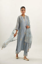 Blue silk chanderi straight kurta set, highlighted with gold zari and gota embroidery.