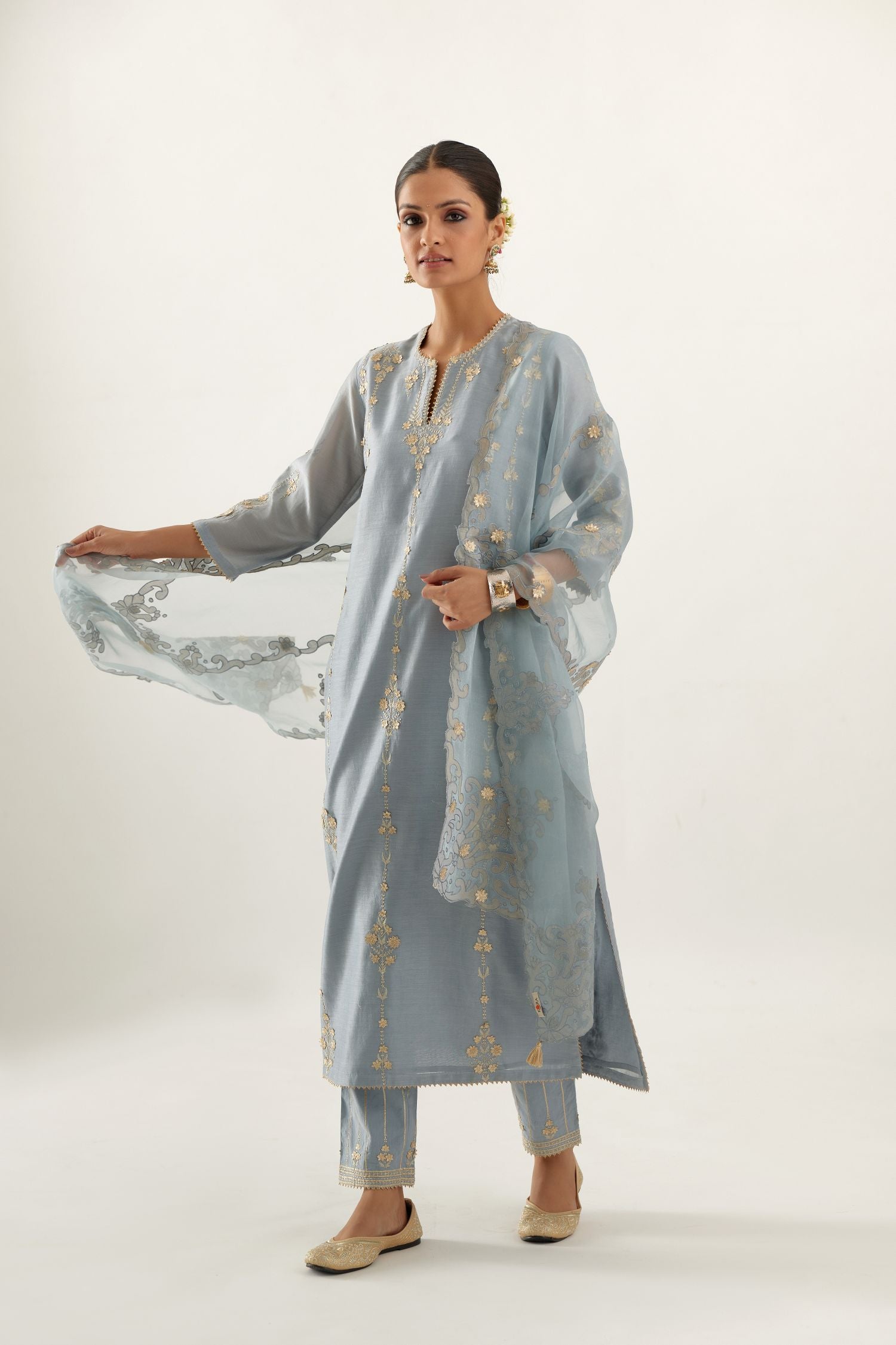 Blue organza dupatta with heavy silk chanderi appliqué embroidery and gota flower detail.
