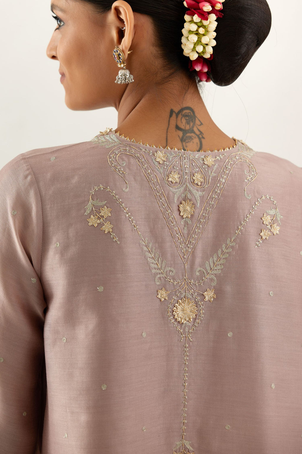 Lilac silk chanderi A-line kurta set, highlighted with gold gota flowers and zari embroidery.