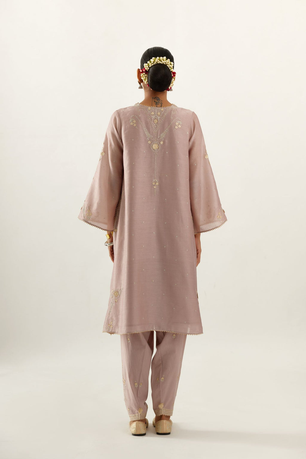 Lilac silk chanderi A-line kurta set, highlighted with gold gota flowers and zari embroidery.