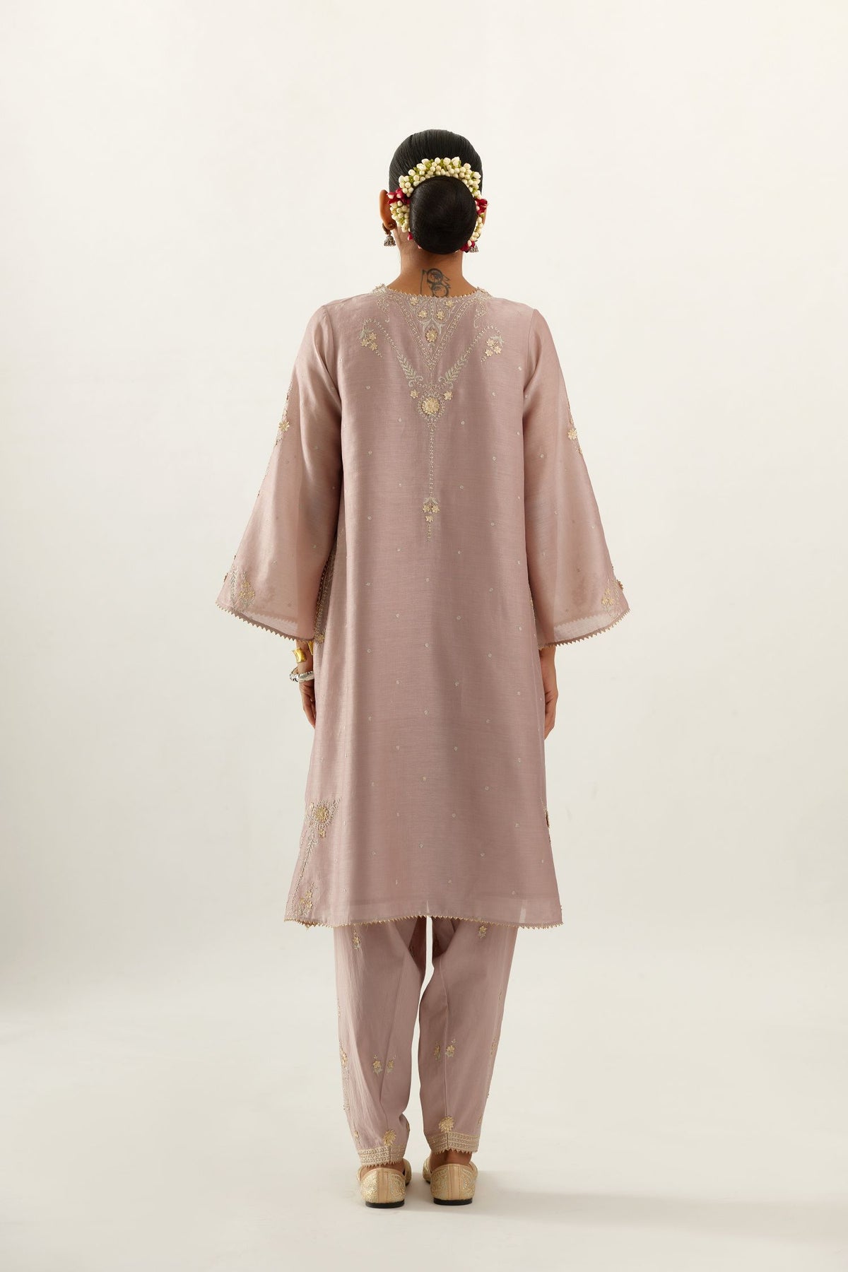 Lilac silk chanderi A-line kurta set, highlighted with gold gota flowers and zari embroidery.