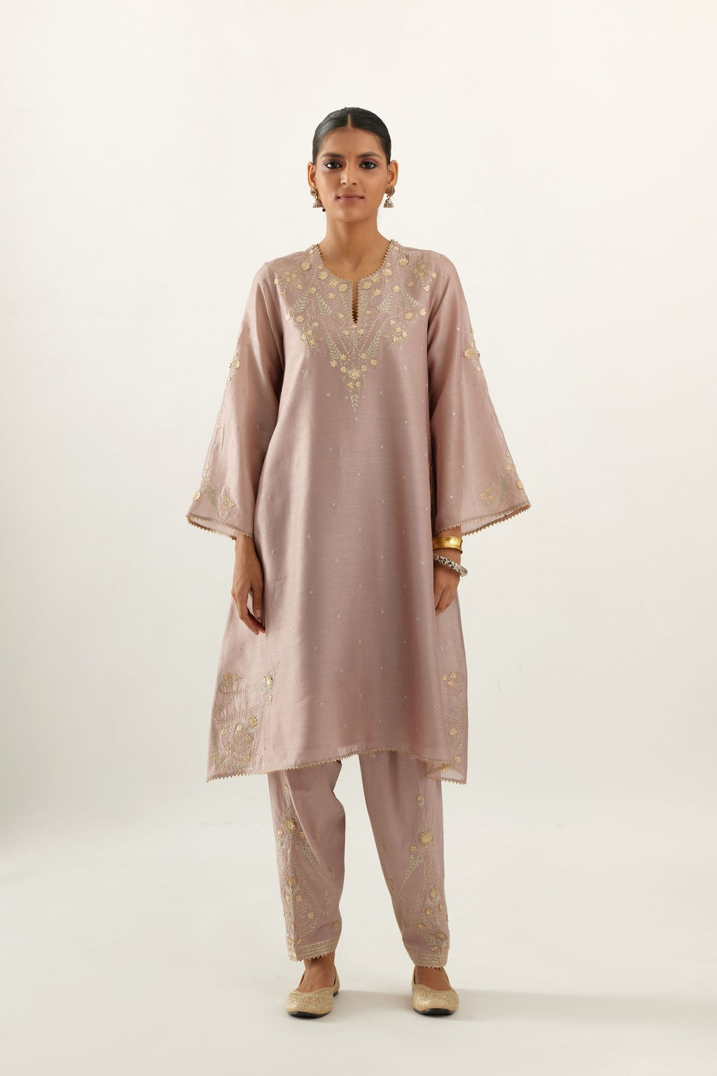 Lilac silk chanderi A-line kurta set, highlighted with gold gota flowers and zari embroidery.