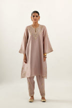 Lilac silk chanderi A-line kurta set, highlighted with gold gota flowers and zari embroidery.