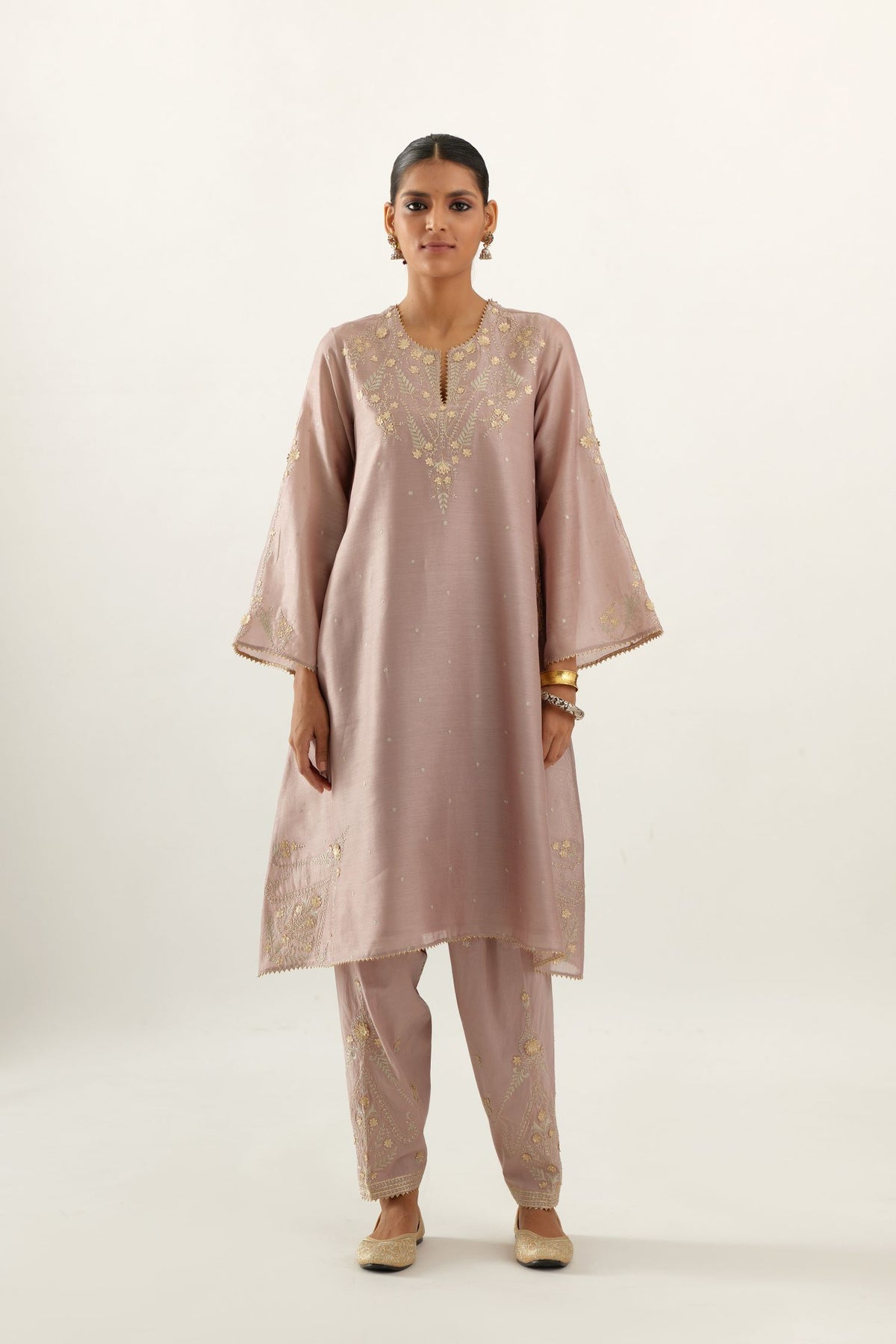 Lilac silk chanderi A-line kurta set, highlighted with gold gota flowers and zari embroidery.