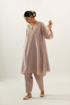 Lilac silk chanderi A-line kurta set, highlighted with gold gota flowers and zari embroidery.