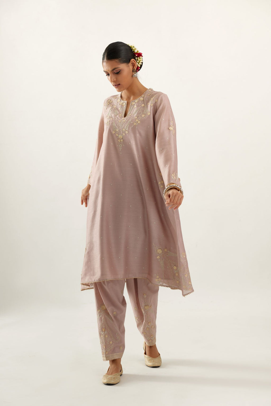 Lilac silk chanderi A-line kurta set, highlighted with gold gota flowers and zari embroidery.