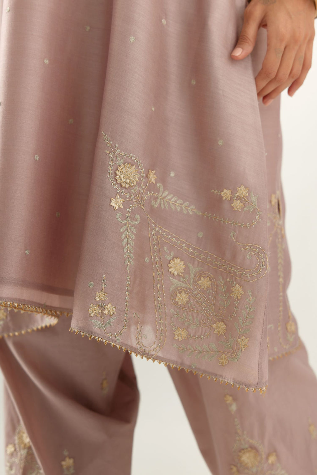 Lilac silk chanderi A-line kurta set, highlighted with gold gota flowers and zari embroidery.