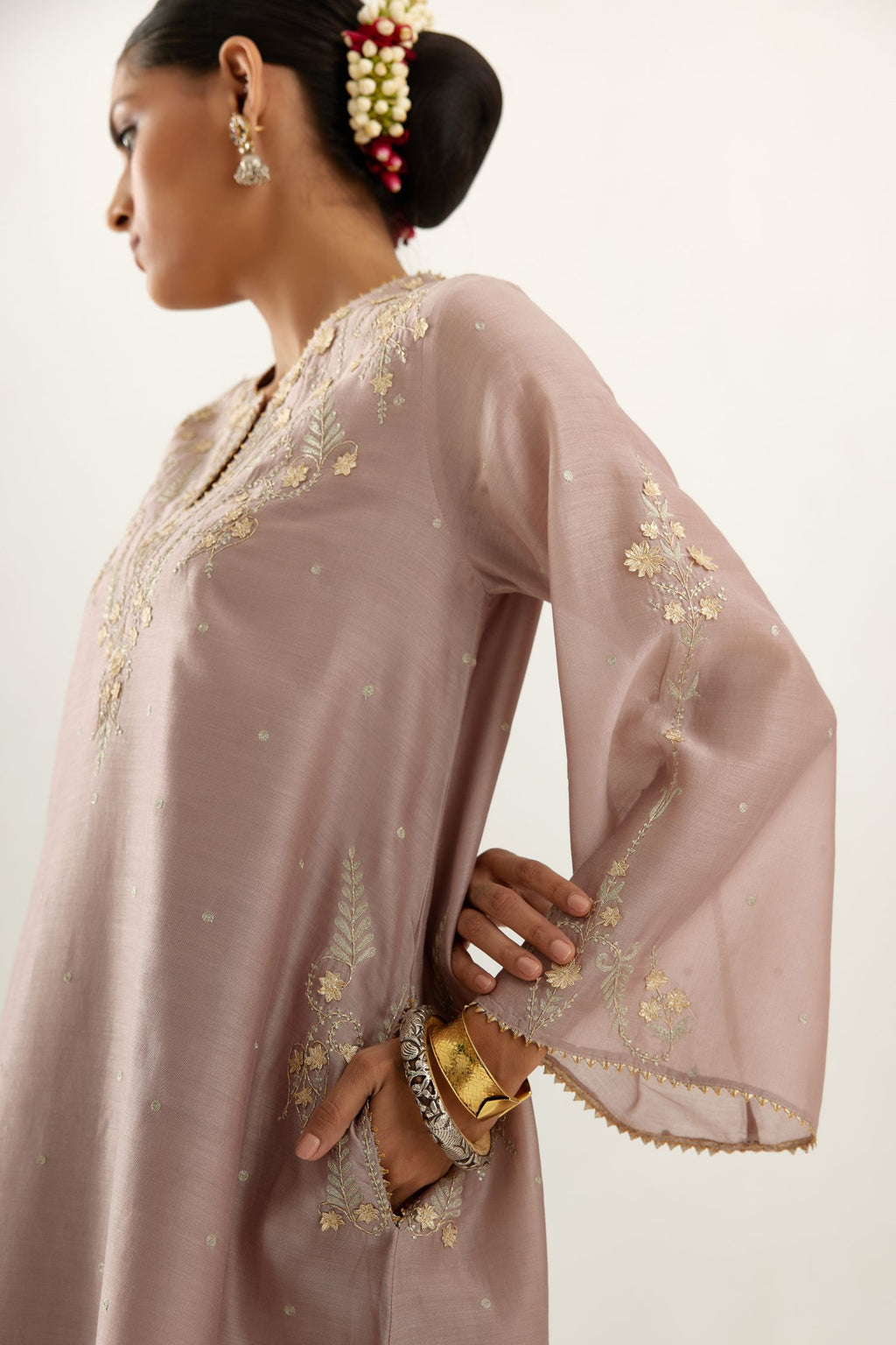 Lilac silk chanderi A-line kurta set, highlighted with gold gota flowers and zari embroidery.