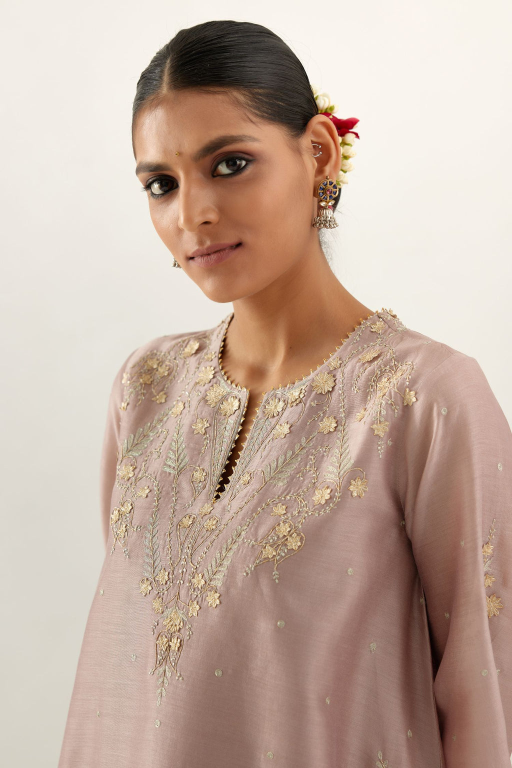 Lilac silk chanderi A-line kurta set, highlighted with gold gota flowers and zari embroidery.