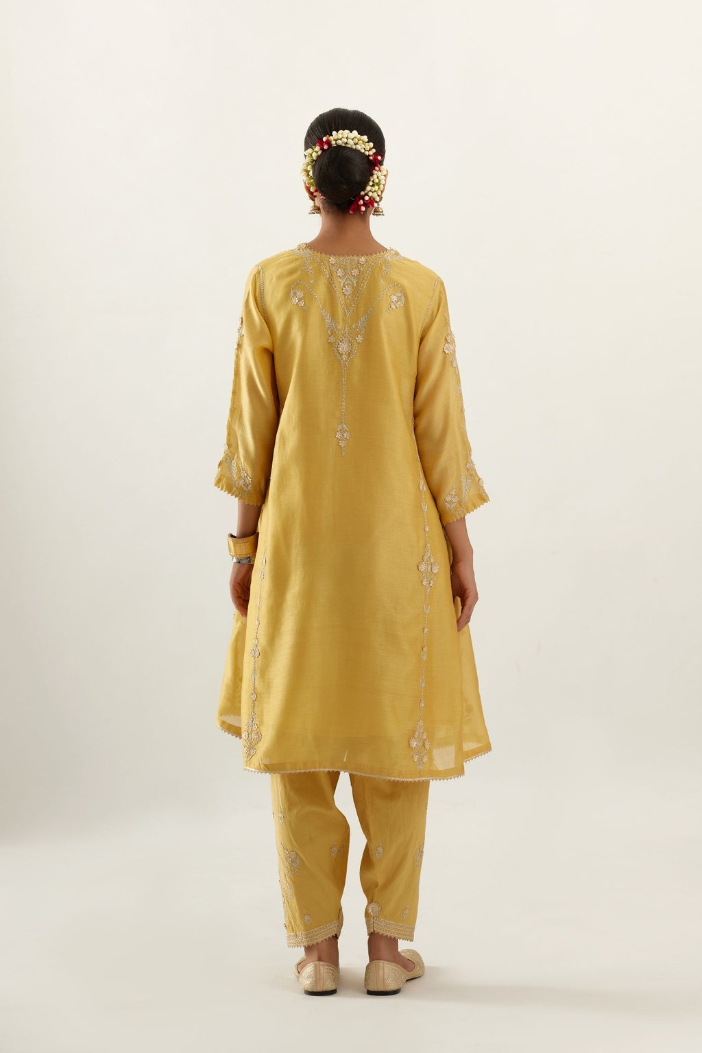 Yellow gold gota and zari embroidered easy fit short kalidar kurta set.
