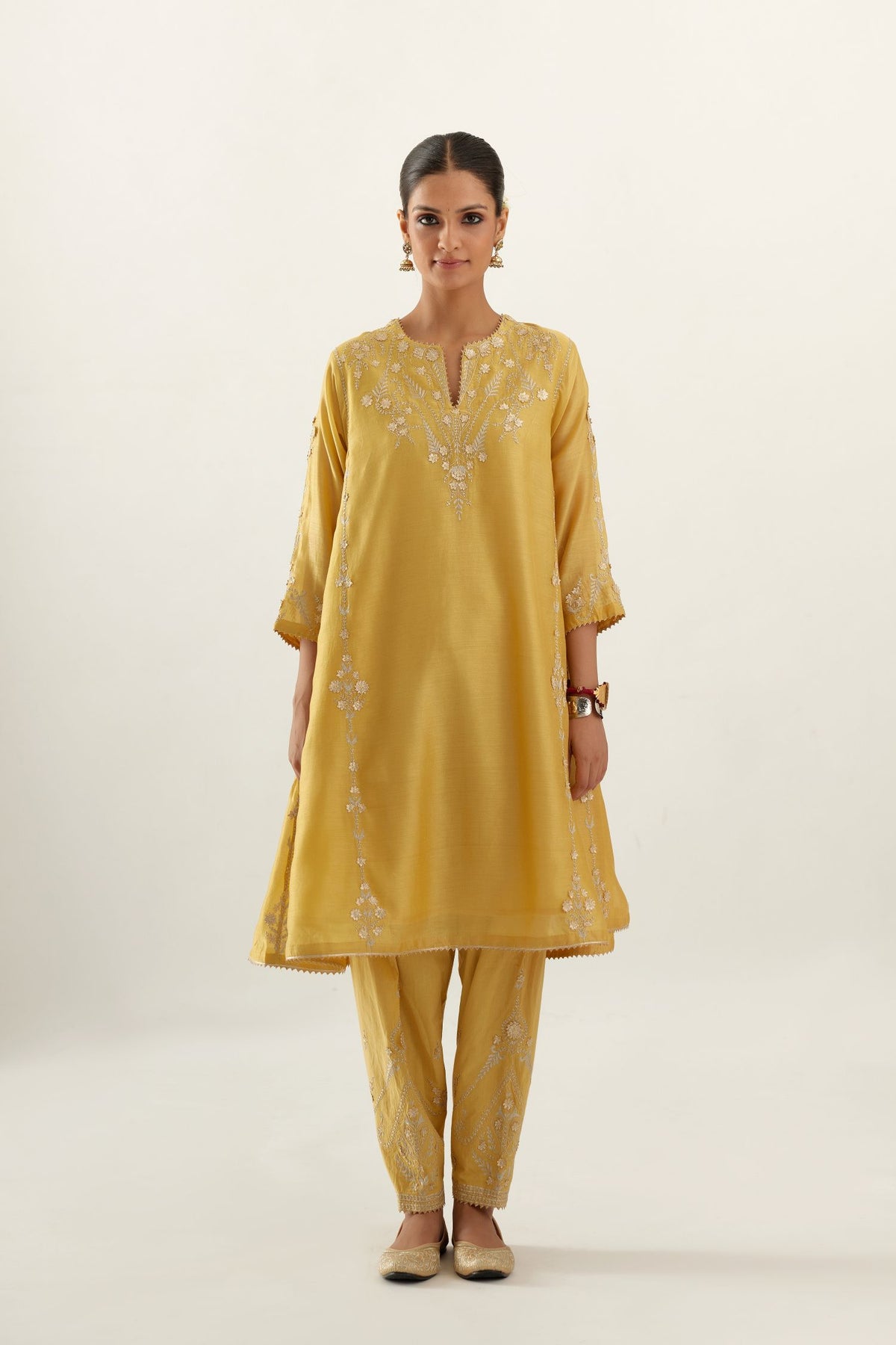 Yellow gold gota and zari embroidered easy fit short kalidar kurta set.