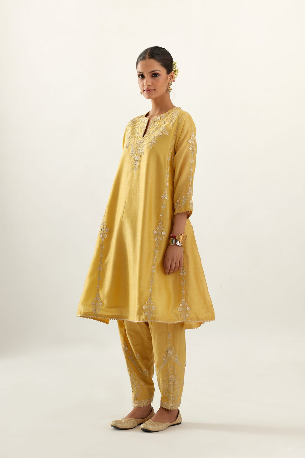 Yellow gold gota and zari embroidered easy fit short kalidar kurta set.