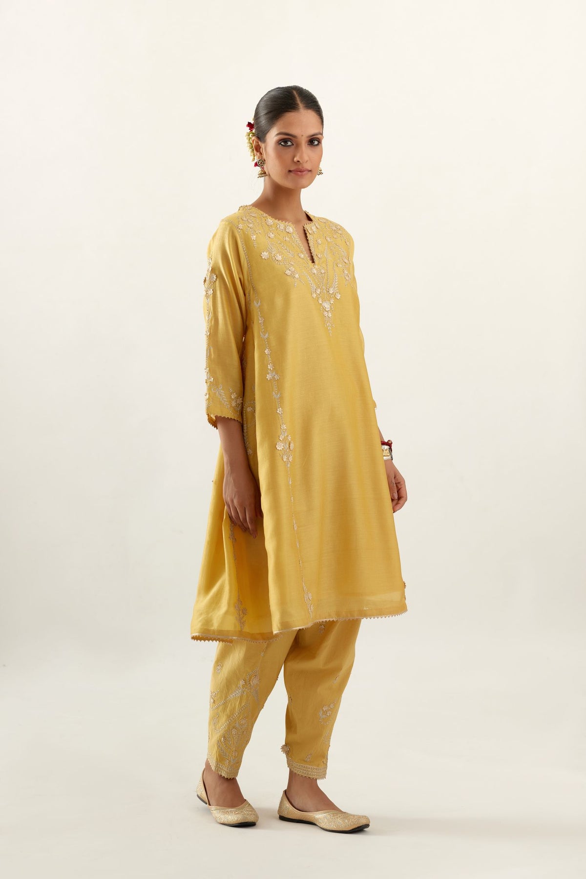 Yellow gold gota and zari embroidered easy fit short kalidar kurta set.