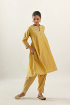 Yellow gold gota and zari embroidered easy fit short kalidar kurta set.