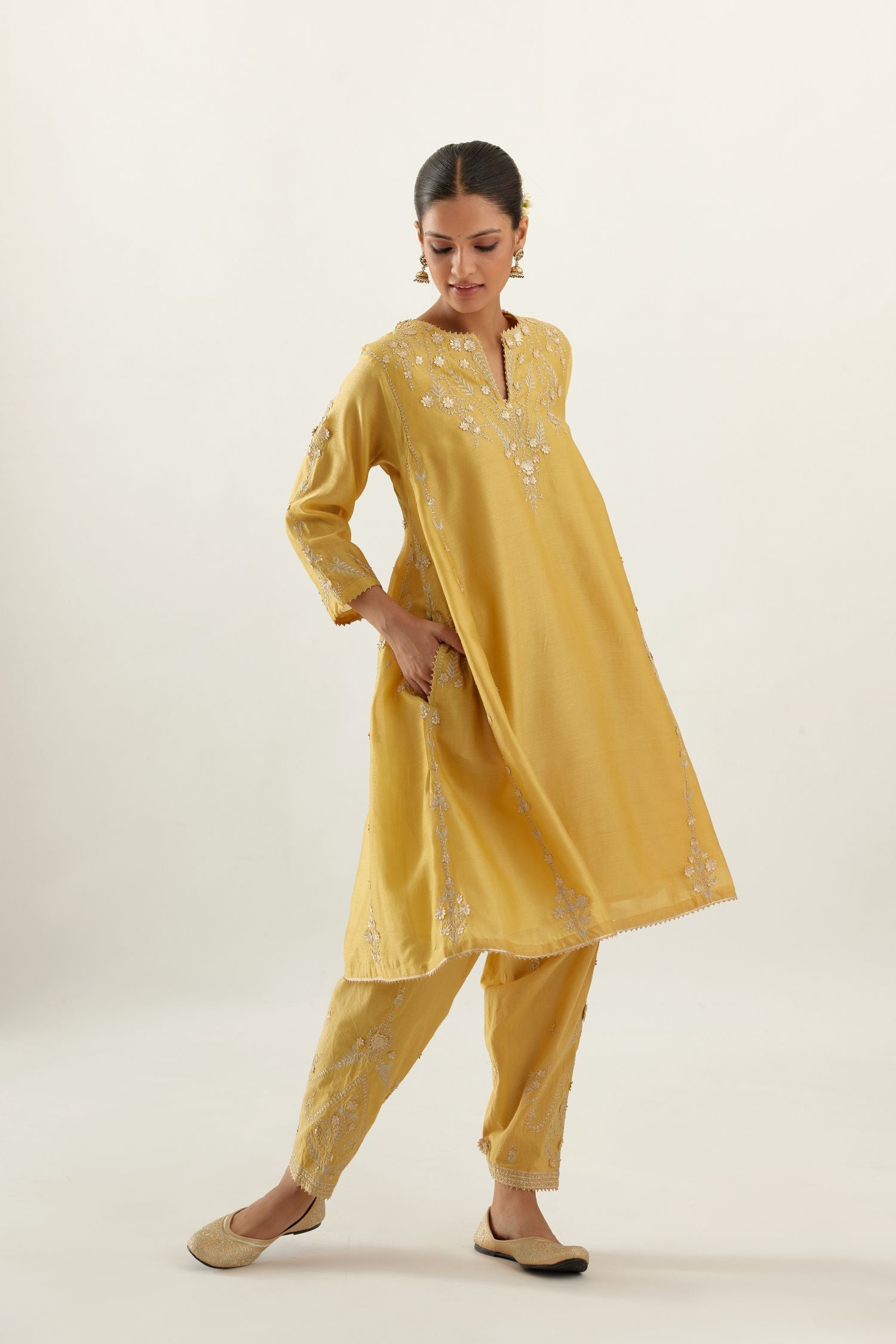 Yellow gold gota and zari embroidered easy fit short kalidar kurta set.
