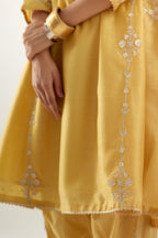 Yellow gold gota and zari embroidered easy fit short kalidar kurta set.