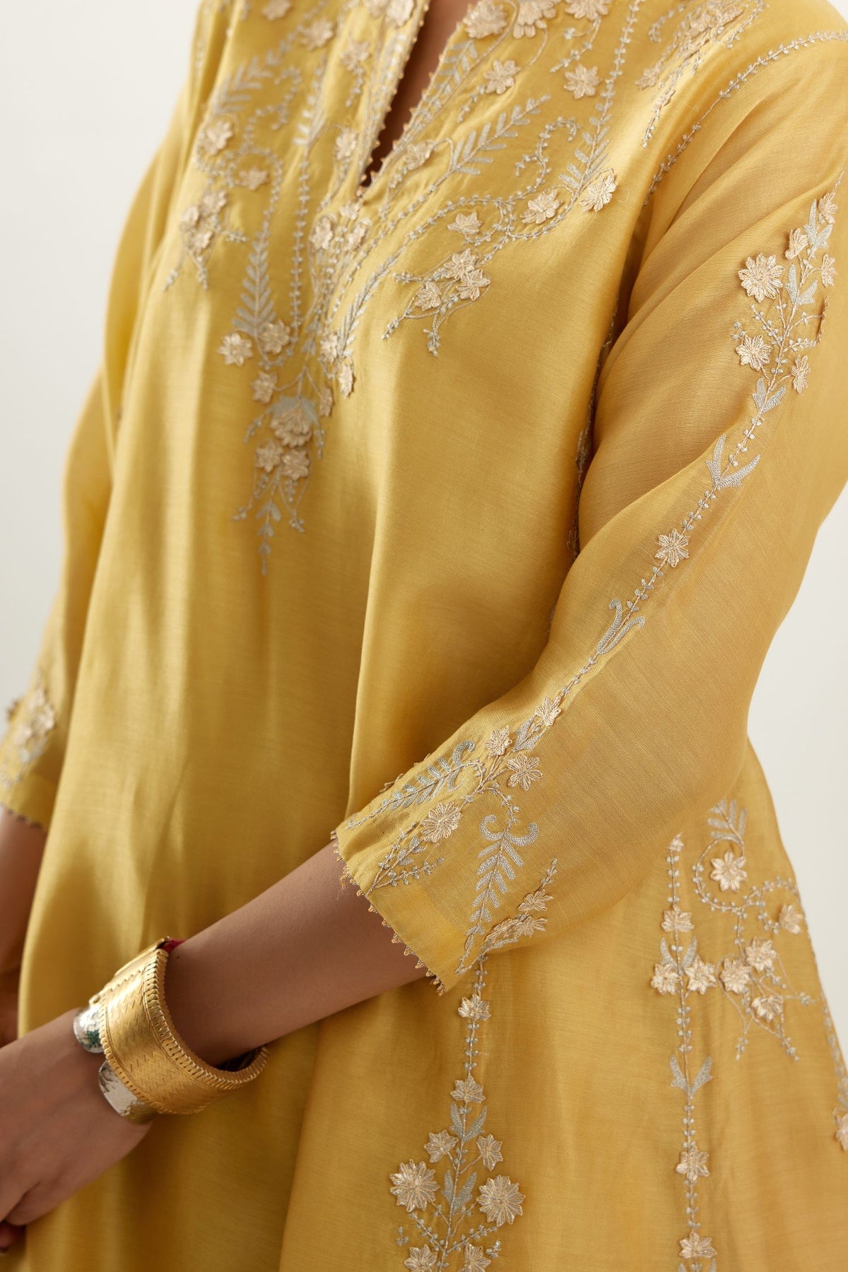Yellow gold gota and zari embroidered easy fit short kalidar kurta set.