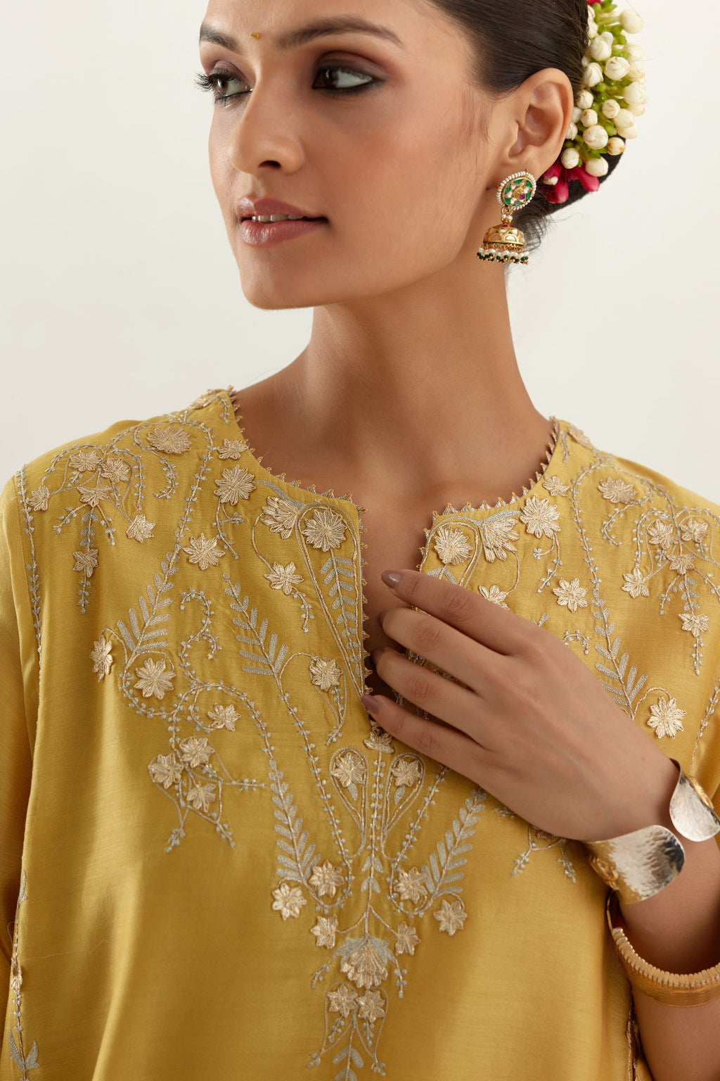 Yellow gold gota and zari embroidered easy fit short kalidar kurta set.