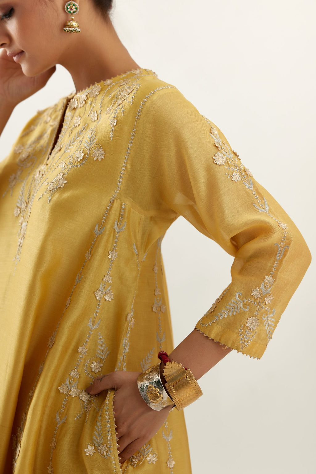 Yellow gold gota and zari embroidered easy fit short kalidar kurta set.