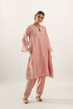 Pink silk chanderi A-line kurta set, highlighted with gold gota flowers and zari embroidery.