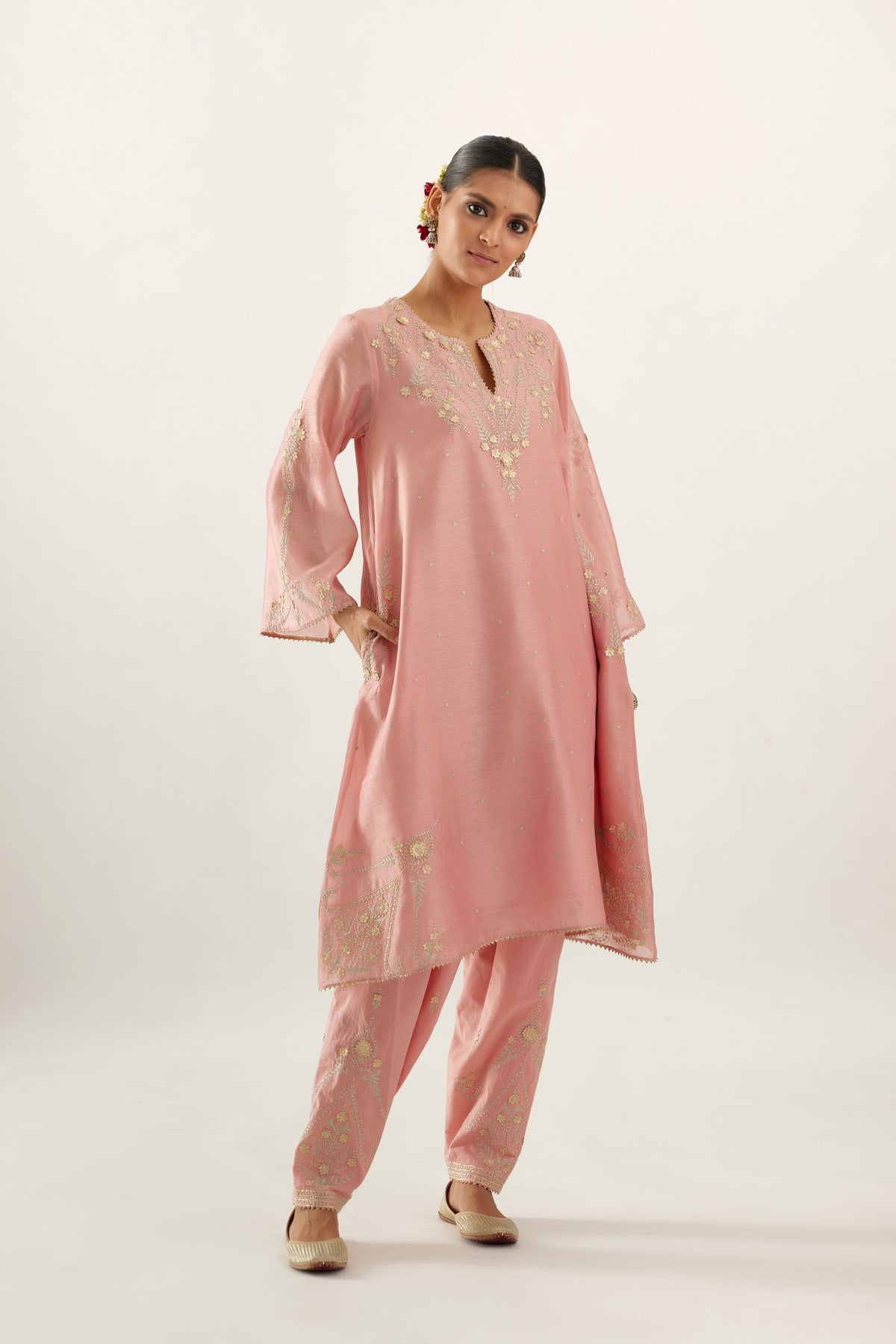 Pink silk chanderi A-line kurta set, highlighted with gold gota flowers and zari embroidery.