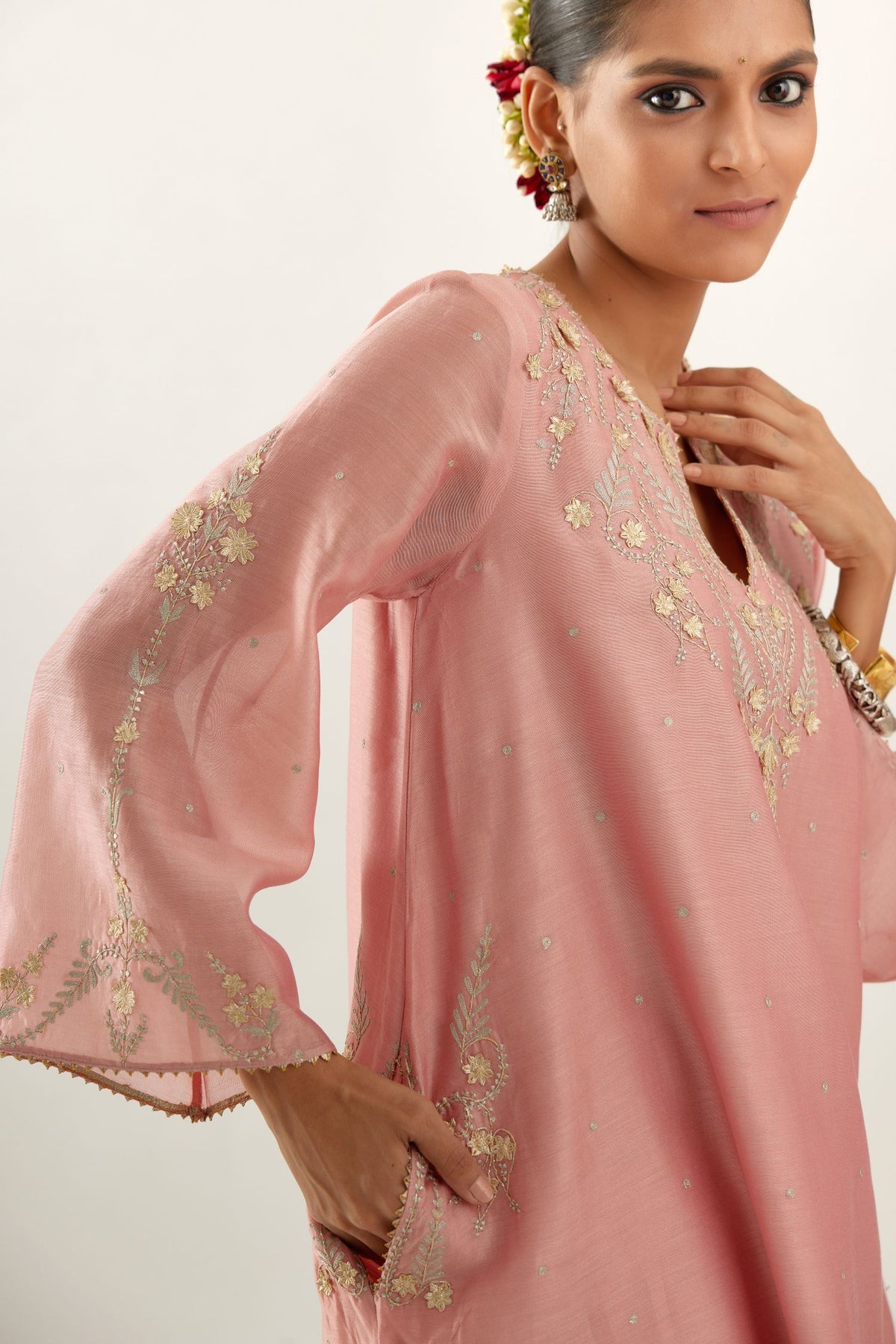 Pink silk chanderi A-line kurta set, highlighted with gold gota flowers and zari embroidery.