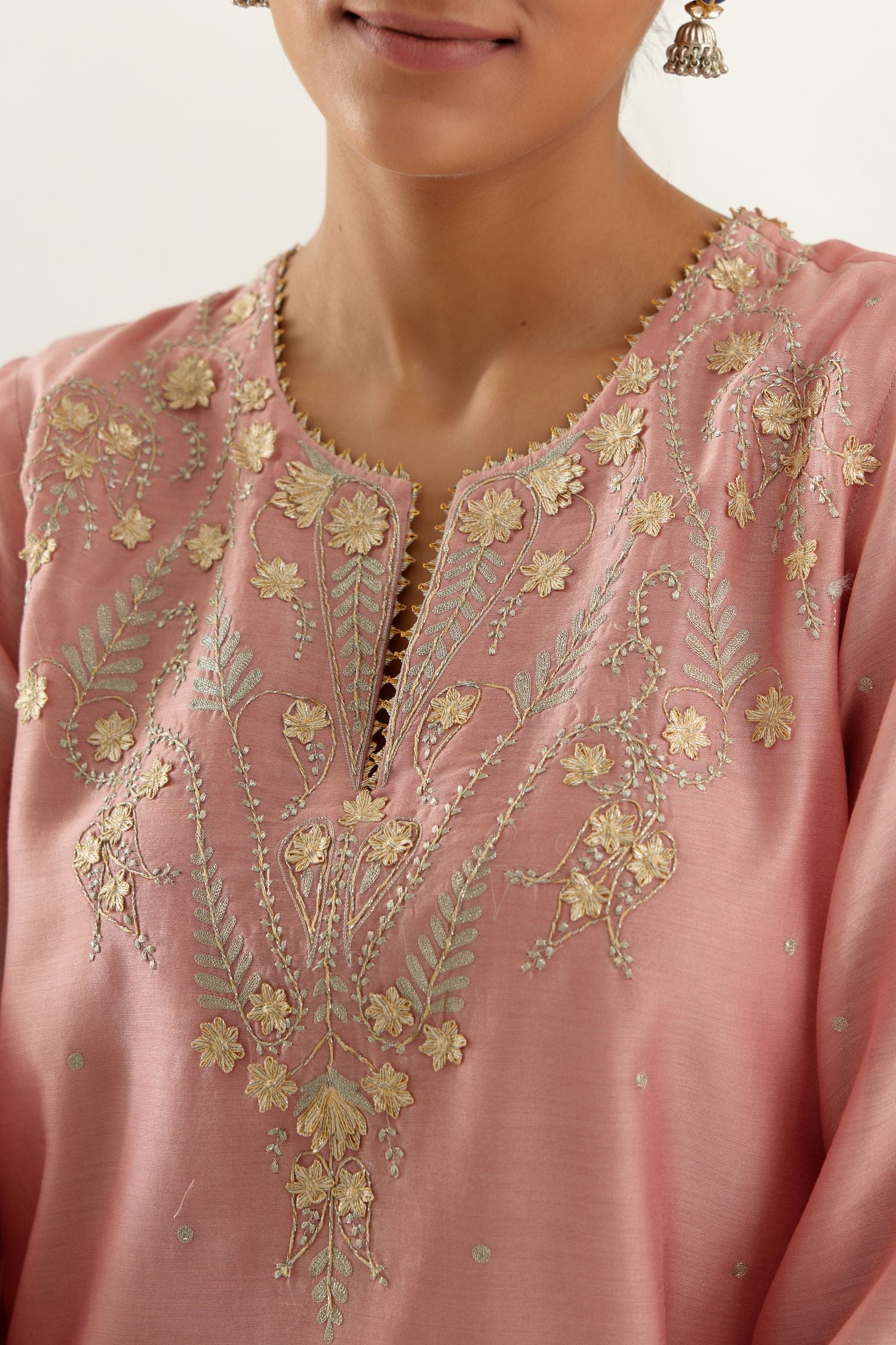 Pink silk chanderi A-line kurta set, highlighted with gold gota flowers and zari embroidery.