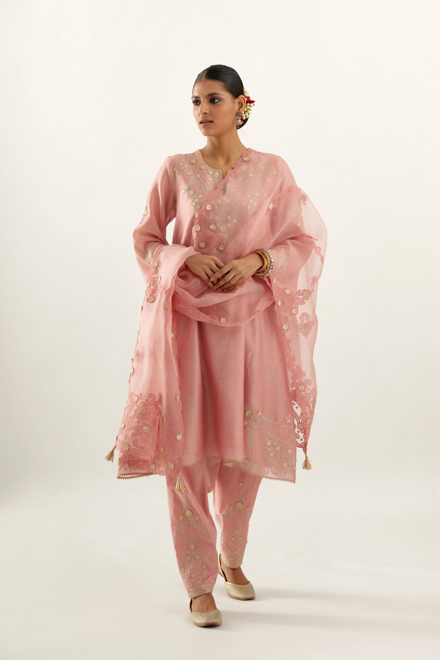 Pink organza dupatta with heavy silk chanderi appliqué embroidery and gota flower detail.