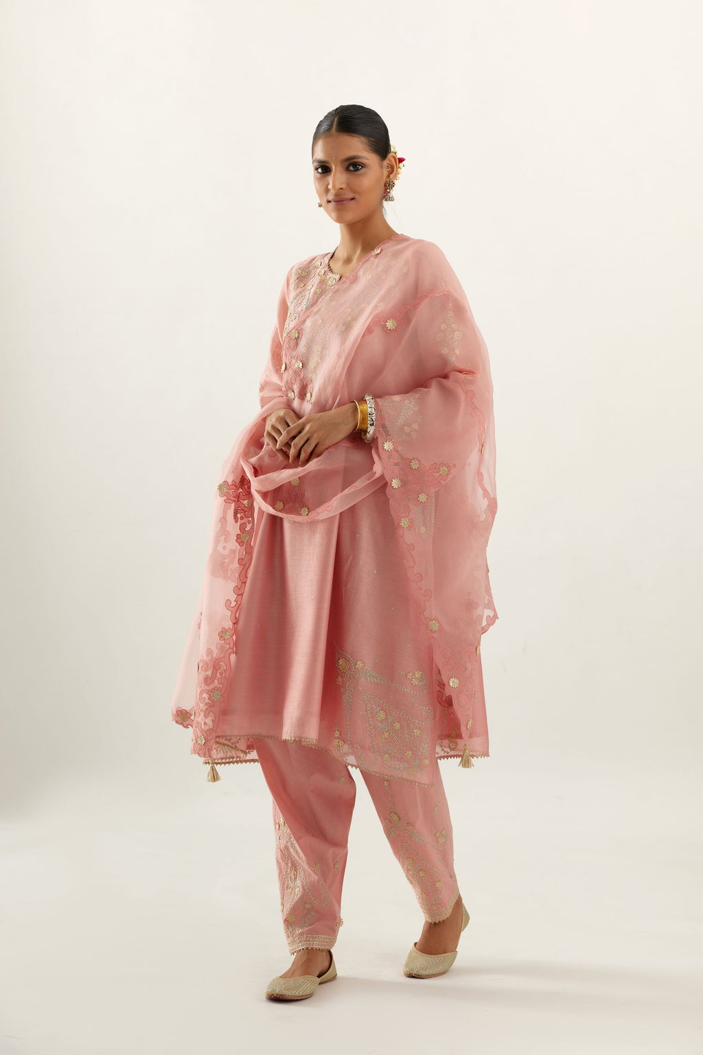 Pink organza dupatta with heavy silk chanderi appliqué embroidery and gota flower detail.