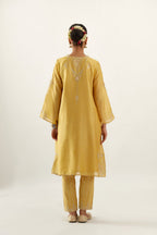 Yellow silk chanderi A-line kurta set, highlighted with gold gota flowers and zari embroidery
