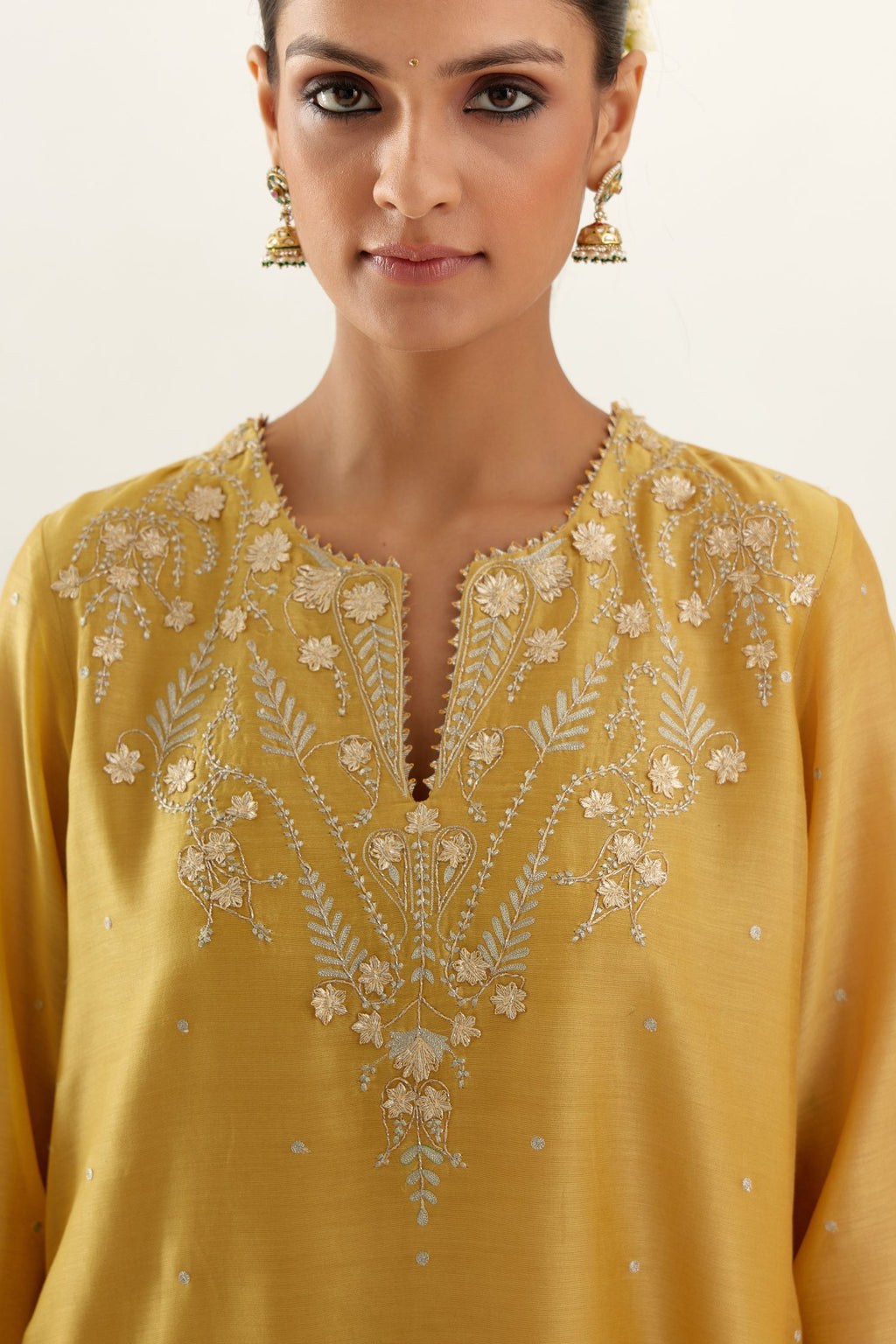 Yellow silk chanderi A-line kurta set, highlighted with gold gota flowers and zari embroidery