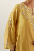 Yellow silk chanderi A-line kurta set, highlighted with gold gota flowers and zari embroidery