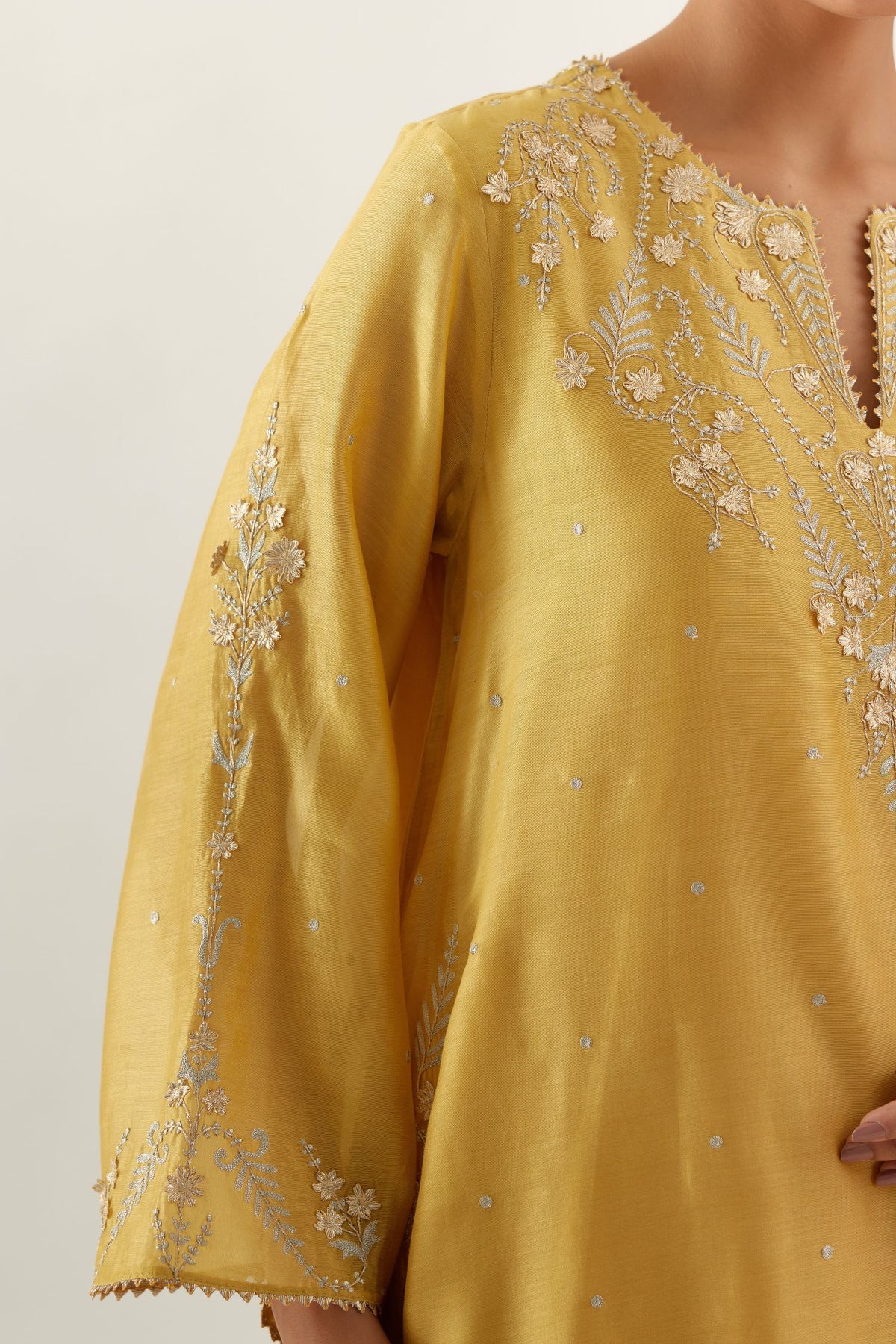 Yellow silk chanderi A-line kurta set, highlighted with gold gota flowers and zari embroidery
