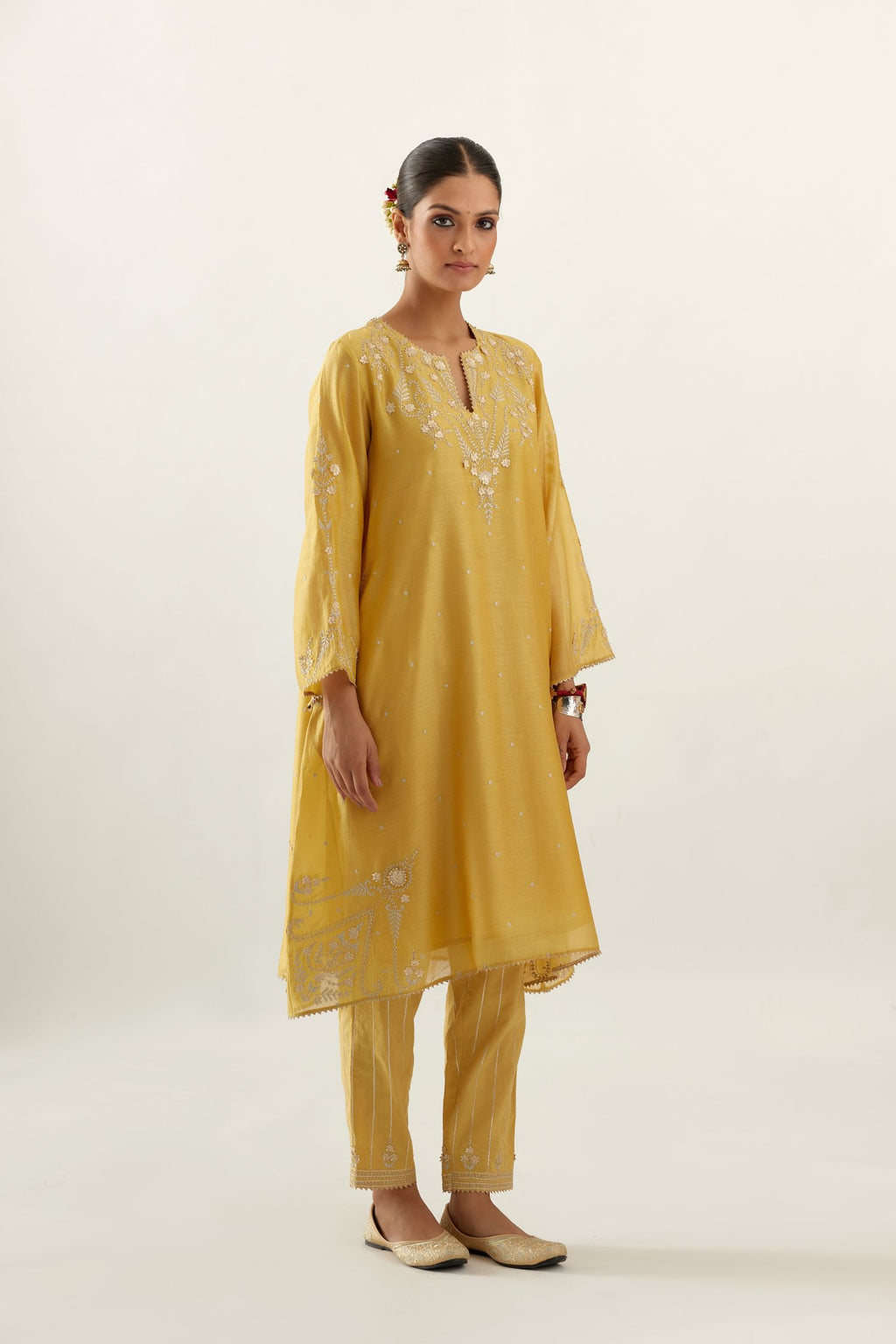 Yellow silk chanderi A-line kurta set, highlighted with gold gota flowers and zari embroidery