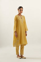 Yellow silk chanderi A-line kurta set, highlighted with gold gota flowers and zari embroidery