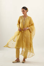 Yellow silk chanderi A-line kurta set, highlighted with gold gota flowers and zari embroidery
