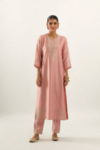 Pink silk chanderi straight kurta set with button placket neckline, highlighted with all-over gold gota and zari embroidery.
