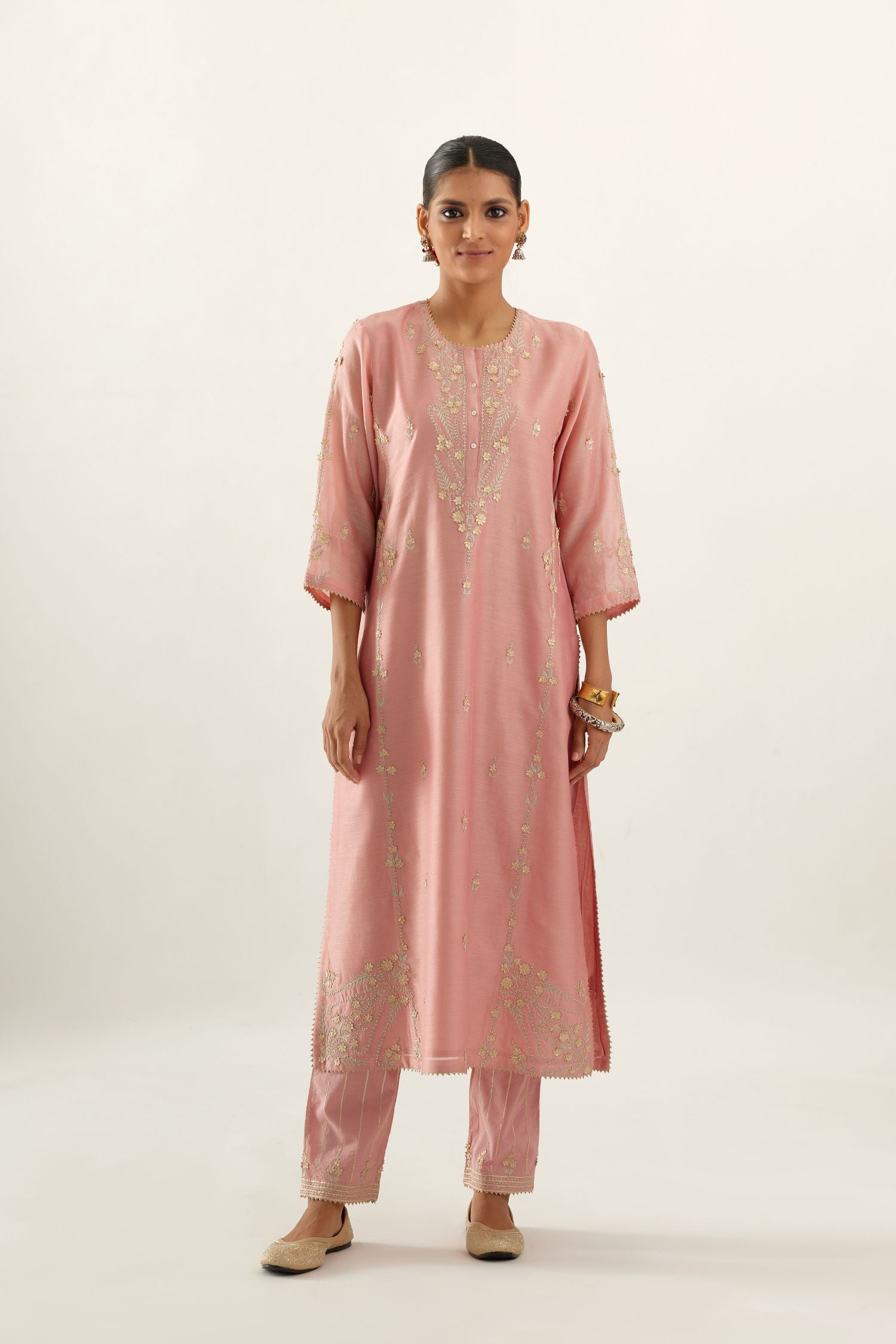Pink silk chanderi straight kurta set with button placket neckline, highlighted with all-over gold gota and zari embroidery.