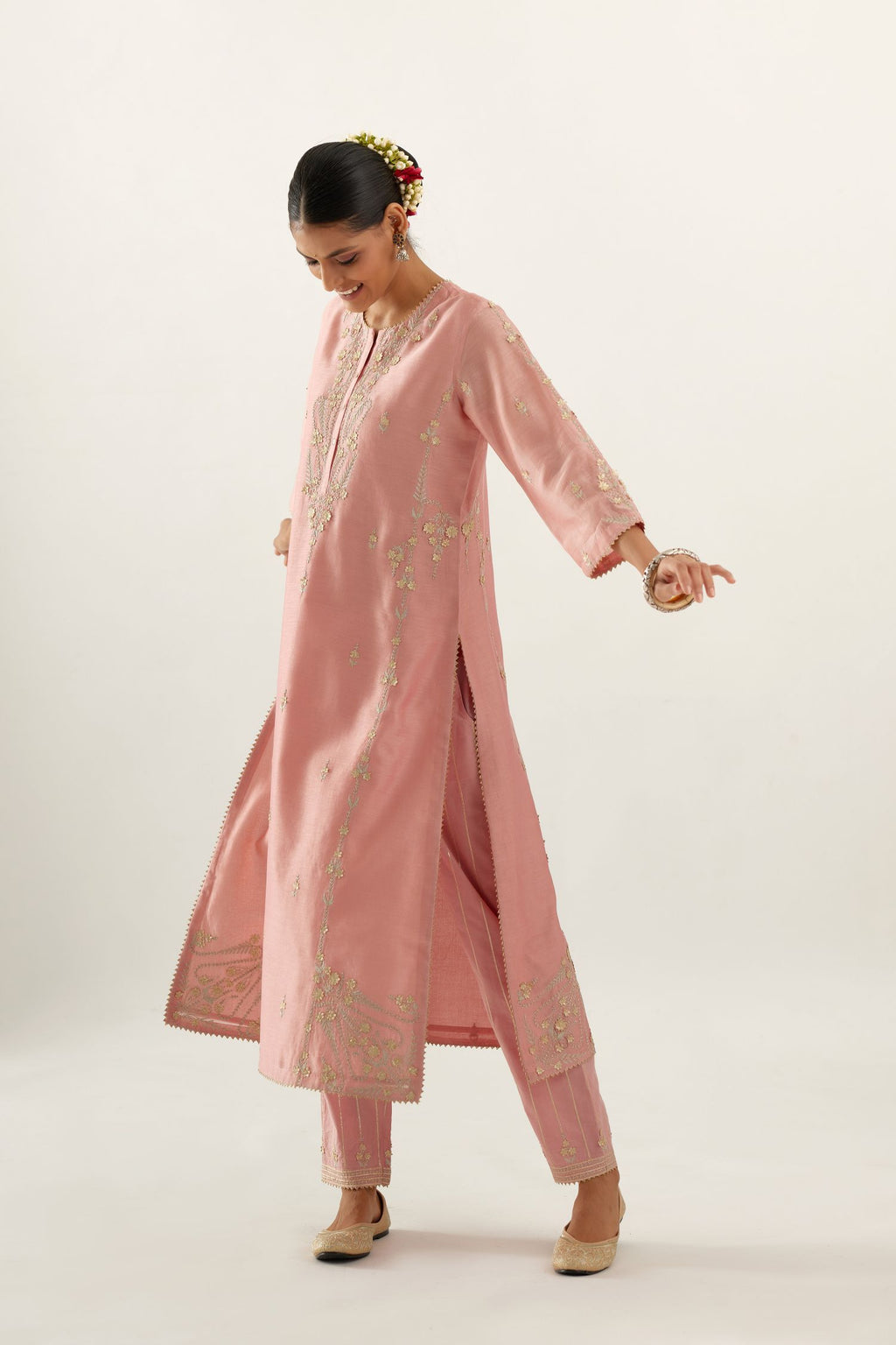 Pink silk chanderi straight kurta set with button placket neckline, highlighted with all-over gold gota and zari embroidery.