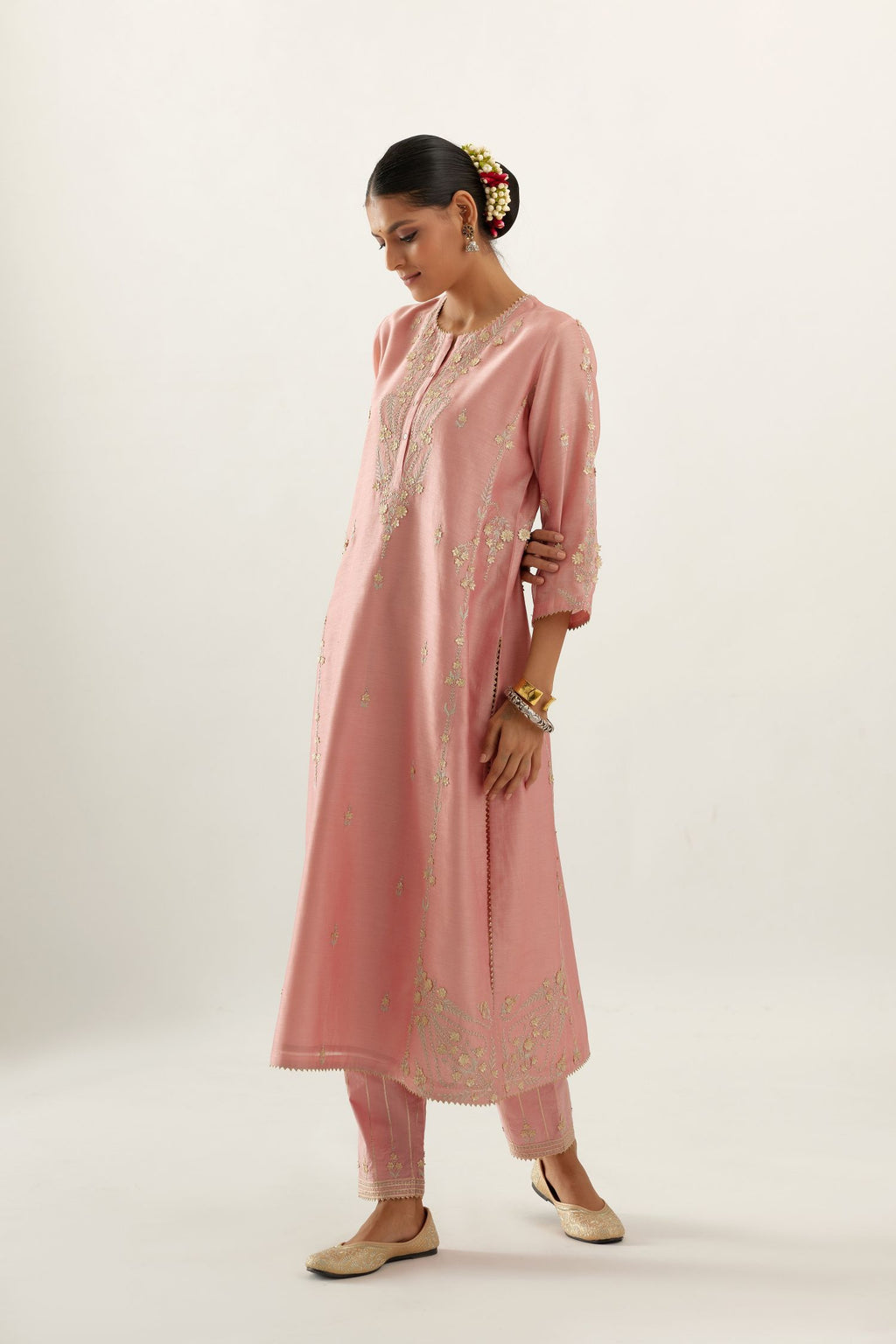 Pink silk chanderi straight kurta set with button placket neckline, highlighted with all-over gold gota and zari embroidery.