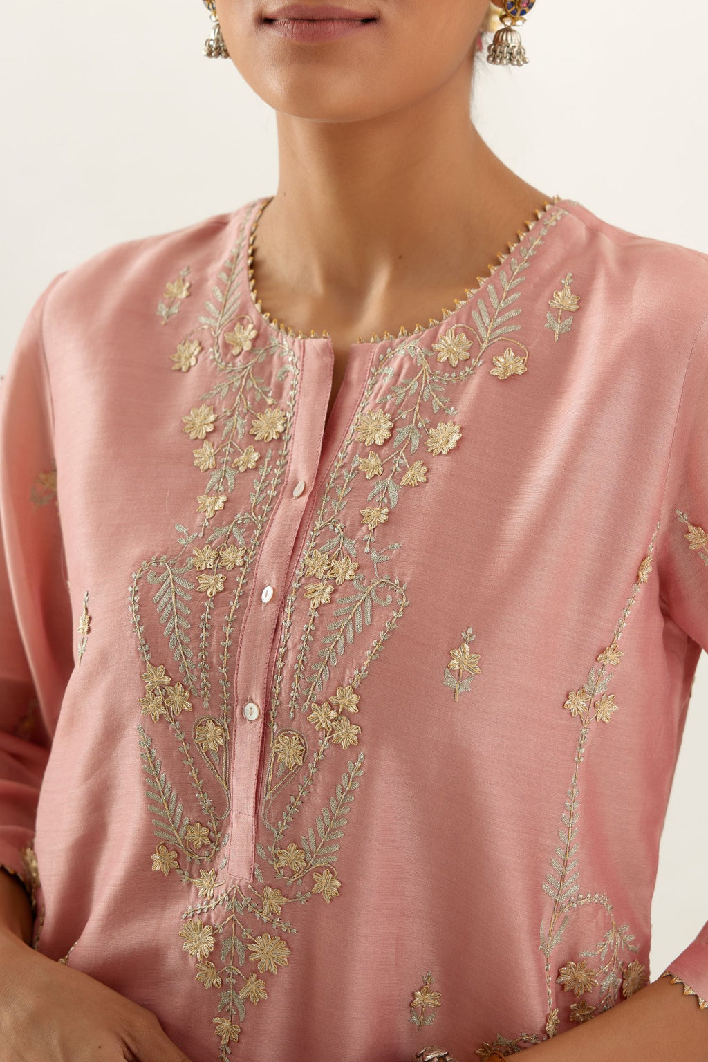 Pink silk chanderi straight kurta set with button placket neckline, highlighted with all-over gold gota and zari embroidery.