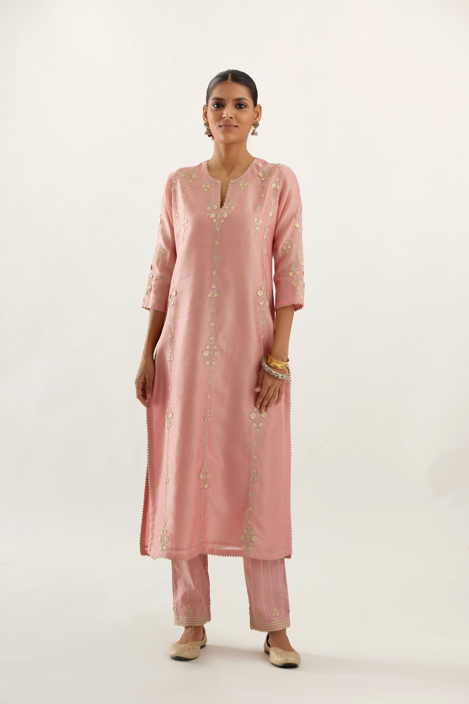 Pink silk chanderi straight kurta set, highlighted with gold zari and gota embroidery.
