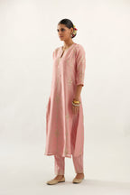 Pink silk chanderi straight kurta set, highlighted with gold zari and gota embroidery.