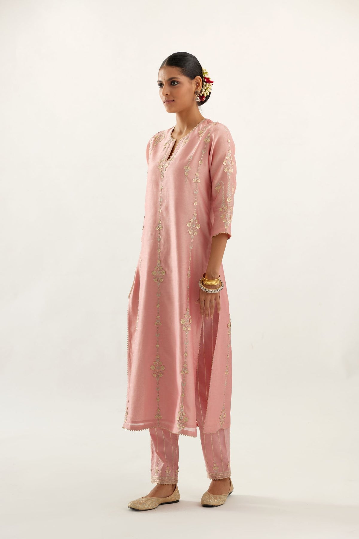 Pink silk chanderi straight kurta set, highlighted with gold zari and gota embroidery.