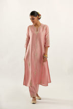 Pink silk chanderi straight kurta set, highlighted with gold zari and gota embroidery.