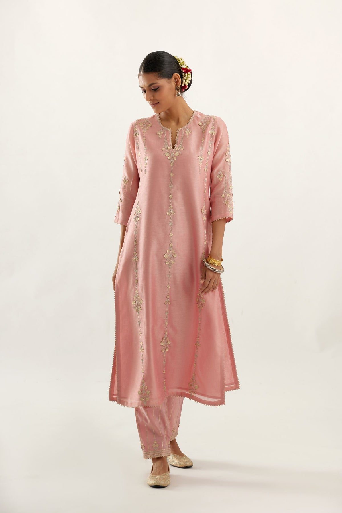 Pink silk chanderi straight kurta set, highlighted with gold zari and gota embroidery.