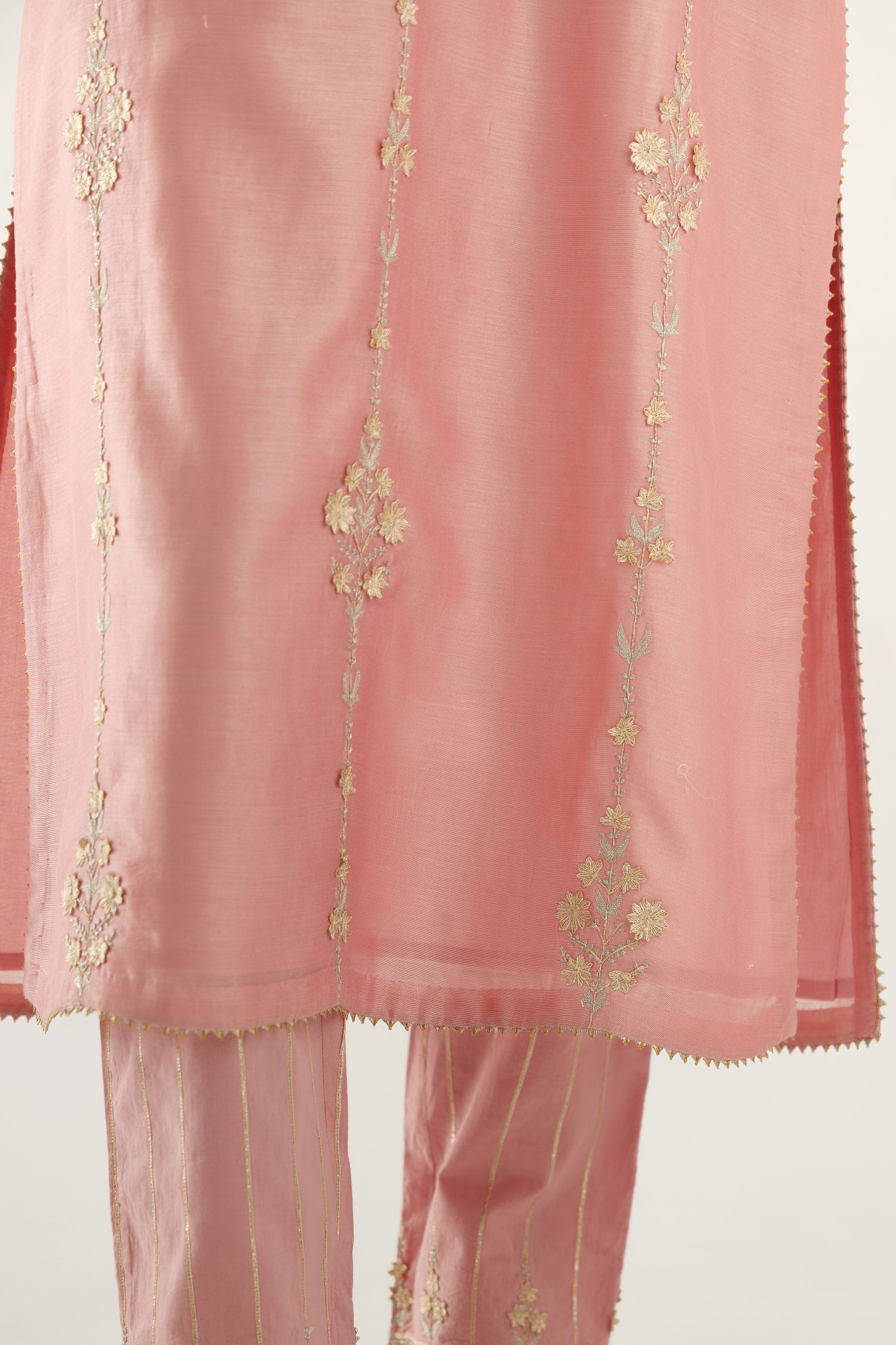 Pink silk chanderi straight kurta set, highlighted with gold zari and gota embroidery.