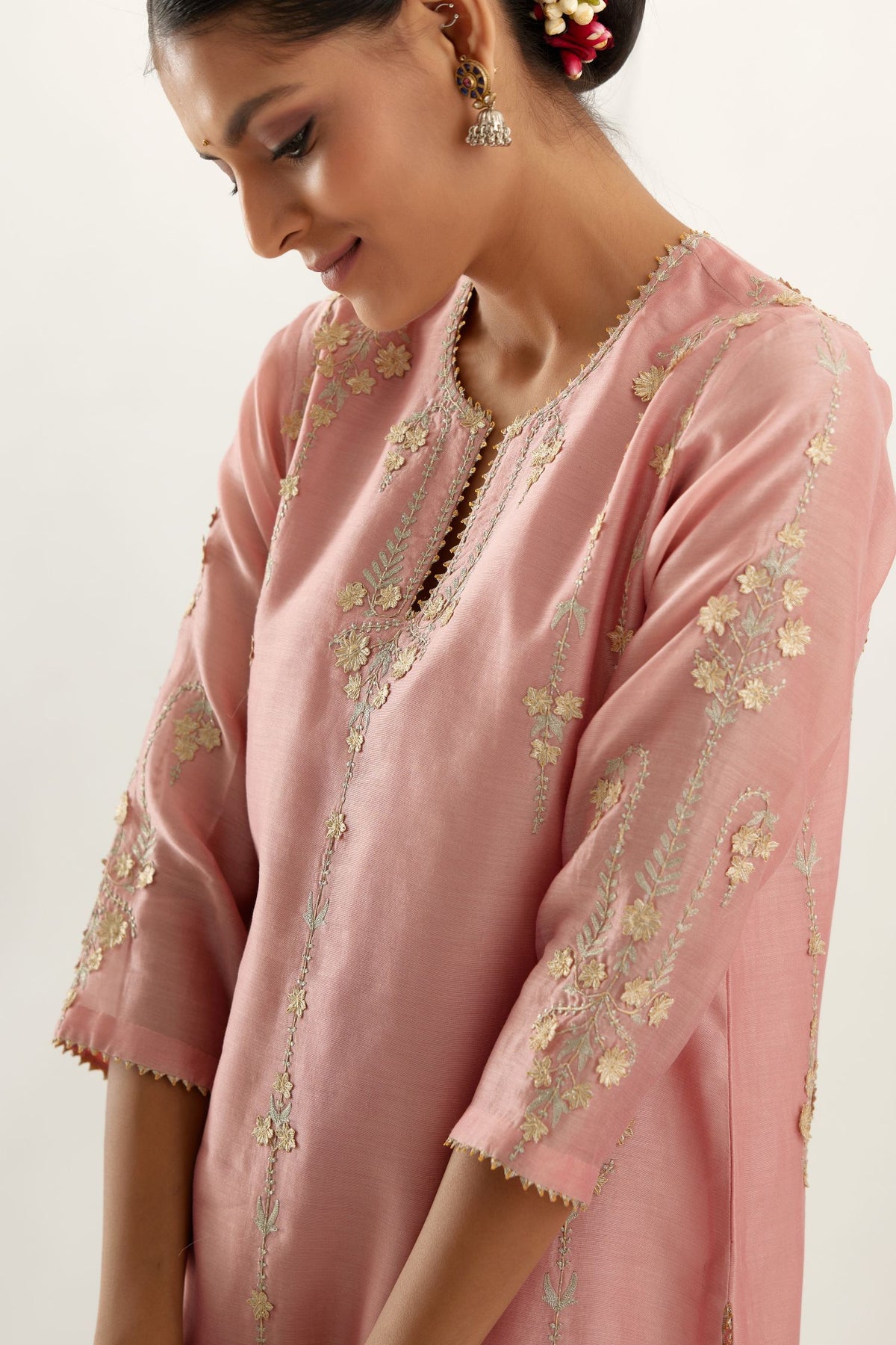 Pink silk chanderi straight kurta set, highlighted with gold zari and gota embroidery.